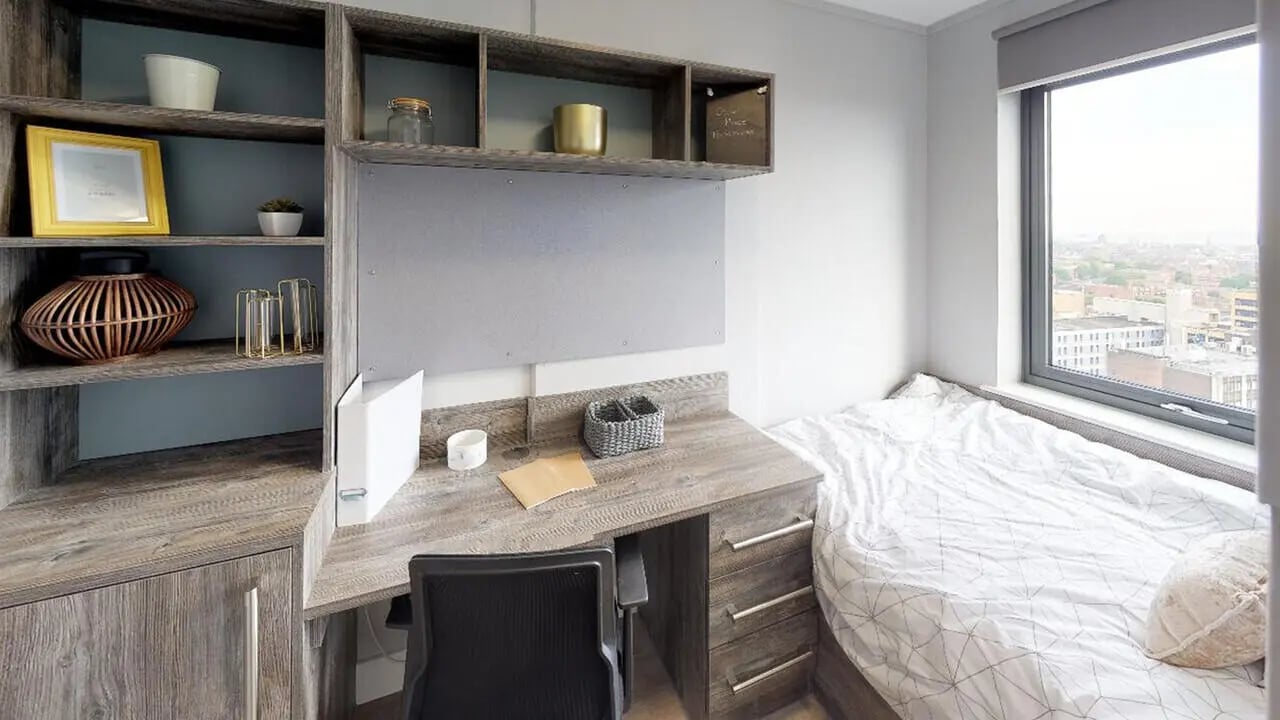 Desk shelves bed and window student bedroom at Collegiate Crown Place Portsmouth in Portsmouth Student Accommodation