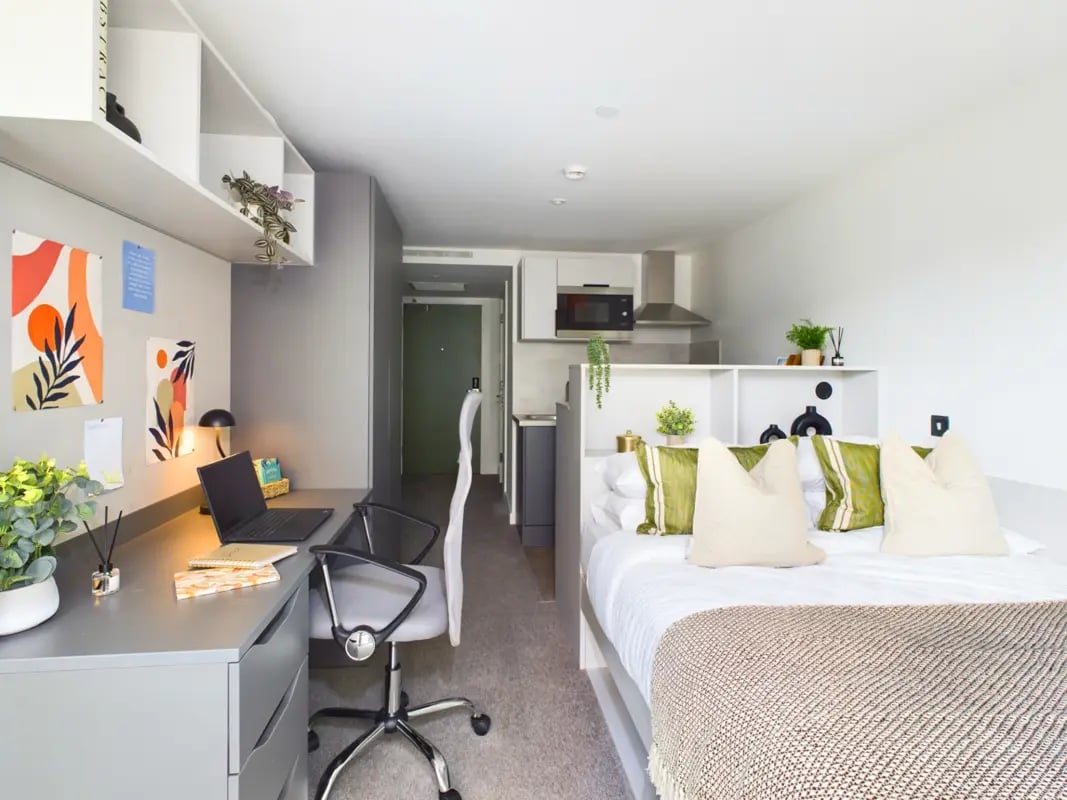 Desk laptop chair bed kitchen area bedroom living room at The Edge in Belfast Student Accommodation
