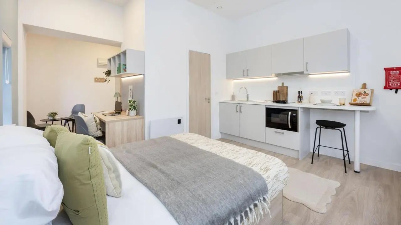 Bed study kitchen and living room at St Gabriels in Manchester Student Accommodation