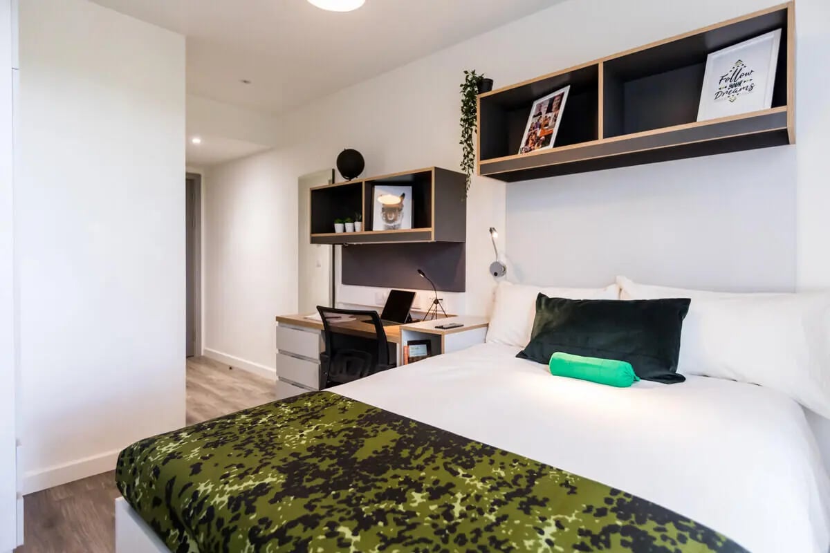 Bed desk shelves and lamp bedroom at The Cam Foundry in Cambridge Student Accommodation