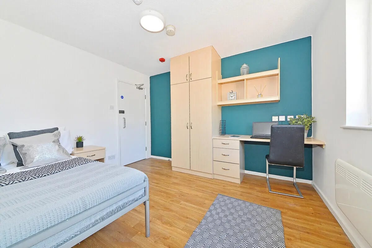 Bed desk wardrobe with decor study area bedroom at Manchester Court in Manchester Student Accommodation