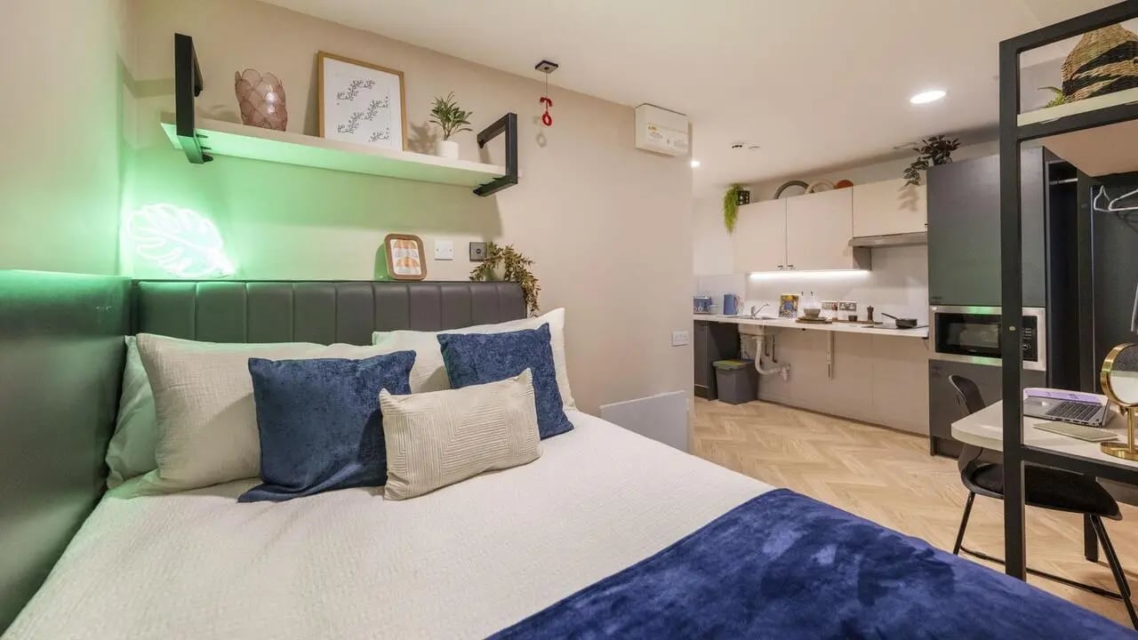 Bed kitchen and desk studio bedroom at Arcadian in Nottingham Student Accommodation