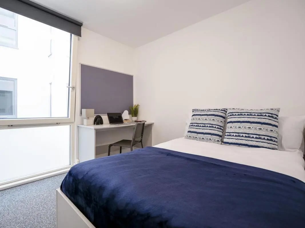 Bed desk and laptop study area bedroom at The Paper Works in Sheffield Student Accommodation