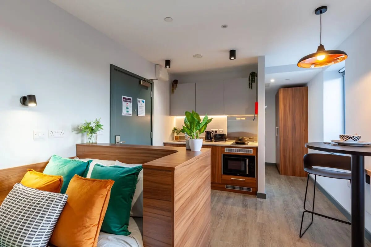 Sofa bed microwave kitchen and dining area studio at Straits Garden in Egham Student Accommodation