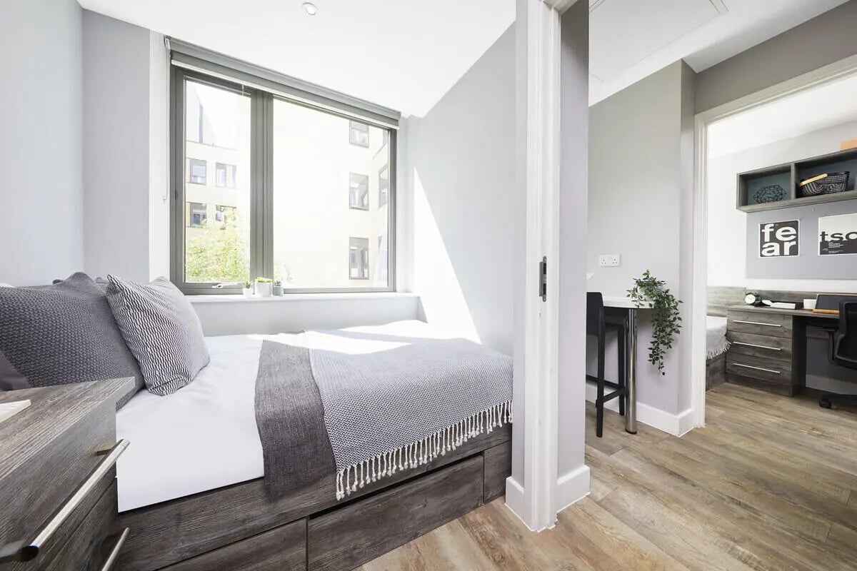 Bed desk and storage with window bedroom at Collegiate Crown Place Cardiff in Cardiff Student Accommodation