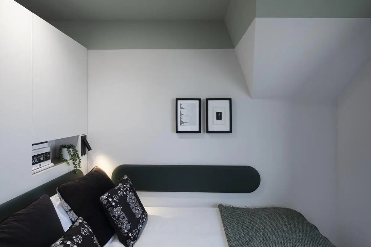 Bed with black pillows green headboard pictures Bedroom at The Keel Houses in Edinburgh Student Accommodation