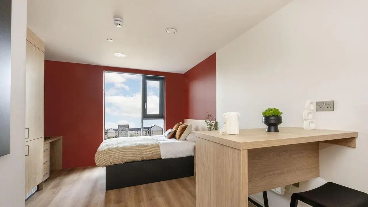 Bed study desk wardrobe and window bedroom at Haymarket Yards in Edinburgh Student Accommodation