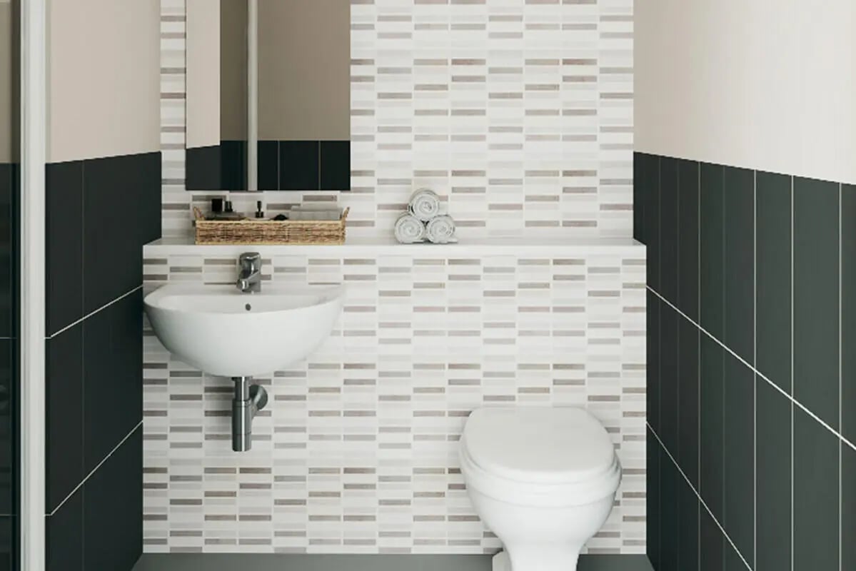 Sink toilet basket towels patterned tiles bathroom at Pavillion - Birmingham in Birmingham Student Accommodation
