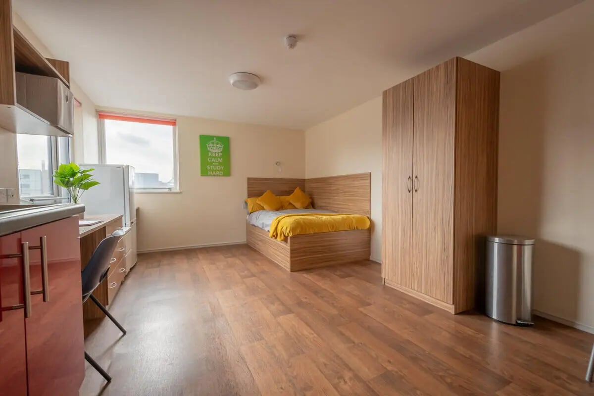 Bed desk wardrobe and bin bedroom at Falkland House in Liverpool Student Accommodation