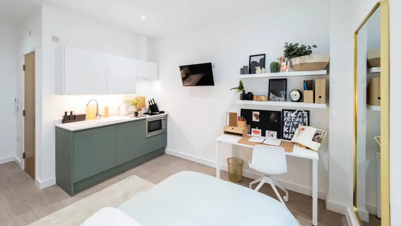 Kitchen desk shelves mirror bedroom at Aire in Stoke-On-Trent Student Accommodation