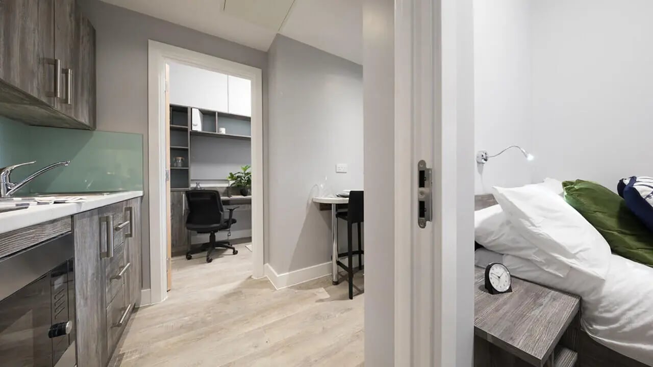Kitchen study desk dining area and bedroom bedroom at Collegiate Crown Place Portsmouth in Portsmouth Student Accommodation