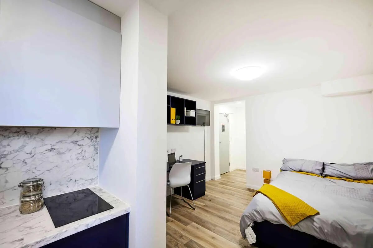 Bed desk hob and cabinets studio room at Hockley Point in Nottingham Student Accommodation