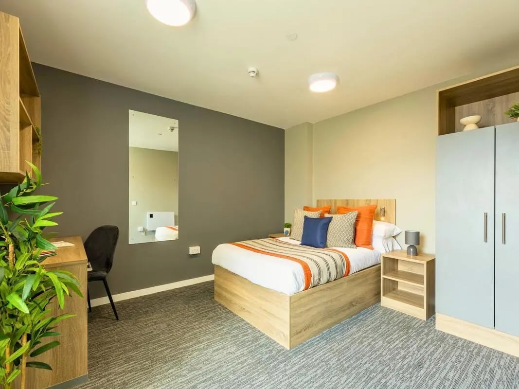 Bed desk wardrobe mirror bedroom at Justice Mill Studios in Aberdeen Student Accommodation