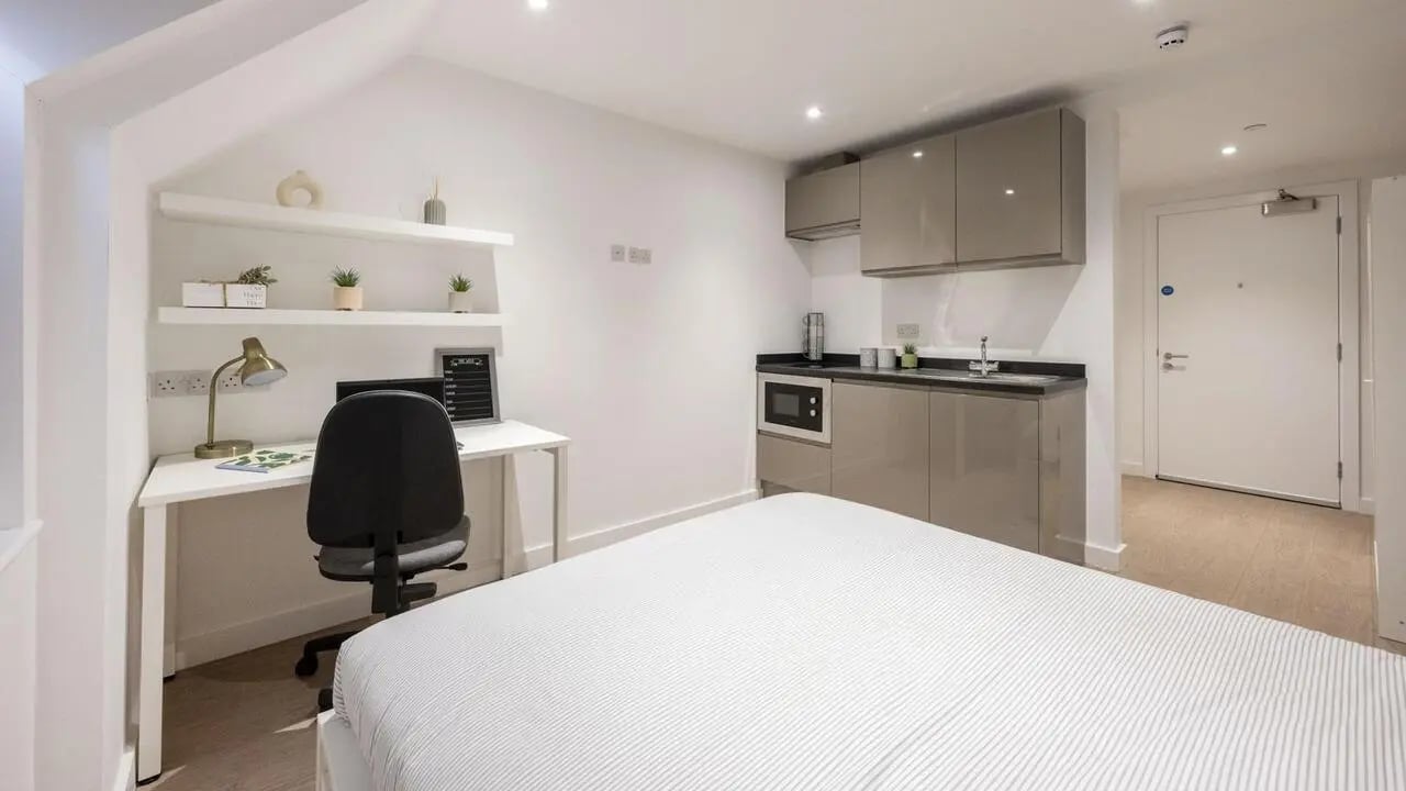 Bed desk microwave and cabinets studio apartment at Sizer Court in Preston Student Accommodation