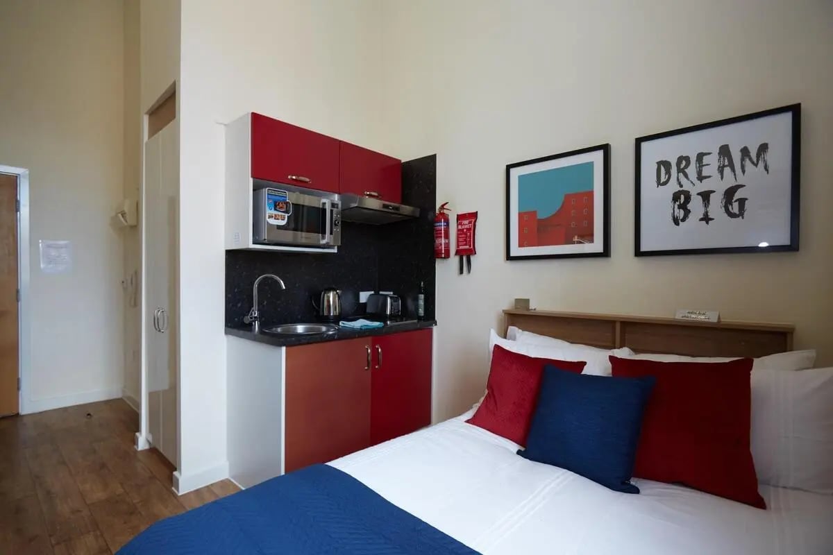 Bed kitchen microwave sink fire extinguisher bedroom at Abbeygate in Chester Student Accommodation