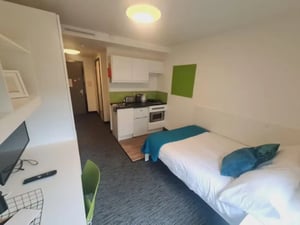 Bed desk kitchen area and storage bedroom at St James Point in Newcastle Upon Tyne Student Accommodation