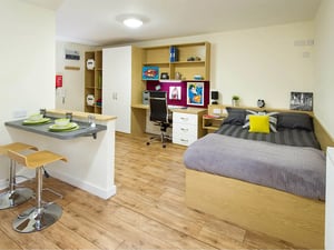 Bed desk shelving and breakfast bar bedroom at Quebec House in Kingston Upon Thames Student Accommodation