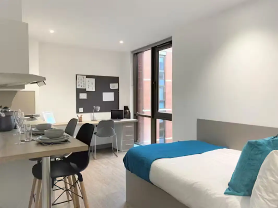 Bed desk and kitchen counter studio apartment at Great Patrick Street in Belfast Student Accommodation