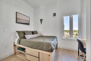 Bed with storage desk and window bedroom at Chapter at Eugene in Eugene Student Accommodation