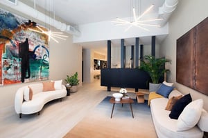 Modern lobby with sofas abstract art plants living room at I5 WYNWOOD in Miami Student Accommodation