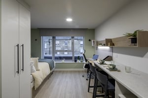 Bed desk and seating area Bedroom at Norton's Student Living in Edinburgh Student Accommodation