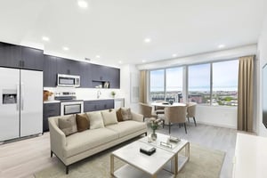 Sofa coffee table kitchen dining living room at Alloy Sunnyside in Denver Student Accommodation