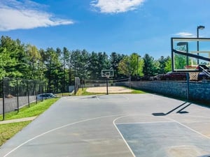 Basketball court with sand volleyball court exterior at Alight Blacksburg in Blacksburg Student Accommodation