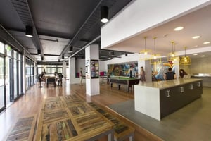 Pool table kitchen island and seating common area at Sydney University Village in Sydney Student Accommodation