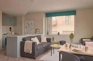 Bed desk chair shelves and plants bedroom study area at Ark Canning Town in London Student Accommodation