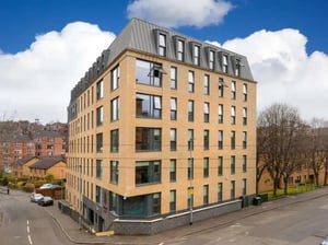 Modern building with many windows exterior at Woodside House in Glasgow Student Accommodation