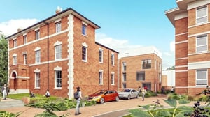 Brick buildings cars and people exterior at St Chads Student Village in Birmingham Student Accommodation