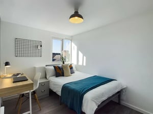 Bed desk and chair in student bedroom at 4 Bedroom House at 75, Saxony Road in Liverpool Student Accommodation