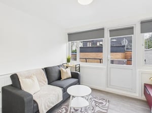 Grey sofa white rug white coffee table living room at 2 Bedroom House at Flat 1, Grove Street Studios, The Groves in Liverpool Student Accommodation
