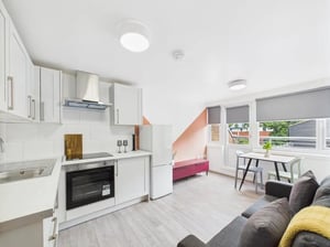 Kitchen, dining area, and living room with sofa at 1 Bedroom House at Flat 22, Grove Street Studios, The Groves in Liverpool Student Accommodation