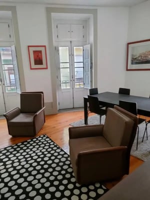 Chairs rug and dining table living room at Nice double bedroom in Ponte de Lima in Viana Do Castelo Student Accommodation