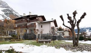 Building with balconies and bare trees exterior at Welcomong 1-bedroom flat in Molina in Valdidentro Student Accommodation