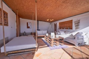 Bed with ropes and couches living area at Amazing ensuite bedroom in Santa Comba Dão, Viseu in Viseu Student Accommodation