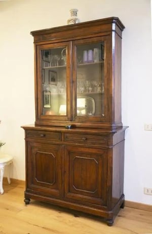 Antique wooden cabinet with glass doors and drawers living room at Charming 1-bedroom apartmemt in Walled City in Lucca Student Accommodation