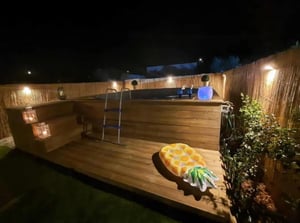 Deck with pool ladder pineapple float outdoor area at Amazing house in Ermidas do Sado, not too far from the beaches of Vila Nova de Milfontes in Vila Nova De Milfontes Student Accommodation