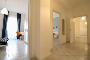 Bed desk lamp chair and bed bedroom at Pretty nice single bedroom in Porta Milano in Brescia Student Accommodation