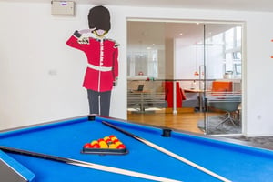Billiard table with cue sticks and balls playing area at Portobello Garrow House in London Student Accommodation