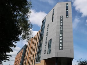 Modern building with BRIDGE HOUSE text exterior at Bridge House - Glasgow in Glasgow Student Accommodation