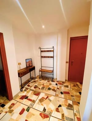Console table bench coat rack entryway at One-Bedroom Apartment in Rome in Rome Student Accommodation