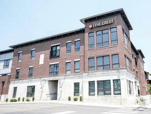 The Crest building with brick exterior exterior at 10 North in Bloomington Student Accommodation