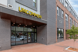 Uncommon building entrance with modern exterior and entrance exterior at Uncommon Raleigh in Raleigh Student Accommodation