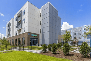 Modern student housing building exterior with landscaping Exterior at Uncommon Wilmington in Wilmington Student Accommodation