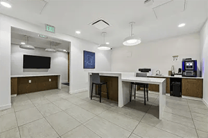 TV counter seating area with coffee machine common area at The View on Pavey Square in Columbus Student Accommodation