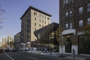 Modern entrance on brick building exterior at Hamilton Court in Philadelphia Student Accommodation
