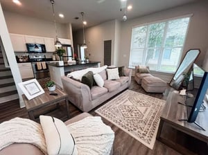 Sofa rug chaise lounge mirror living room at The Highlands in Reno Student Accommodation