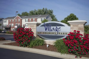 The Village at Colbert Park sign exterior at The Village at Colbert Park in Savoy Student Accommodation